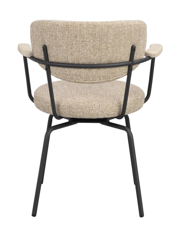 Stol med beige klädsel och svart metallstomme sedd bakifrån, rundad rygg och vita armstöd