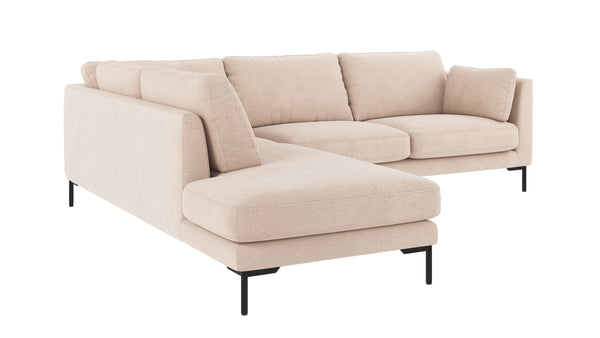 Beige hörnsoffa med schäslong och svarta metallben i modern design