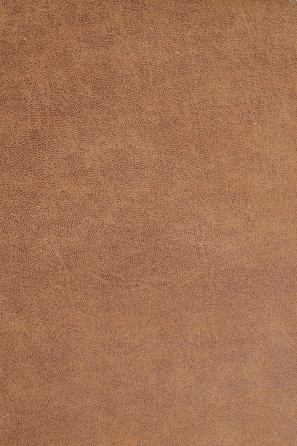 Brunbeige läderstruktur med naturlig slitning och patina för möbler och inredning